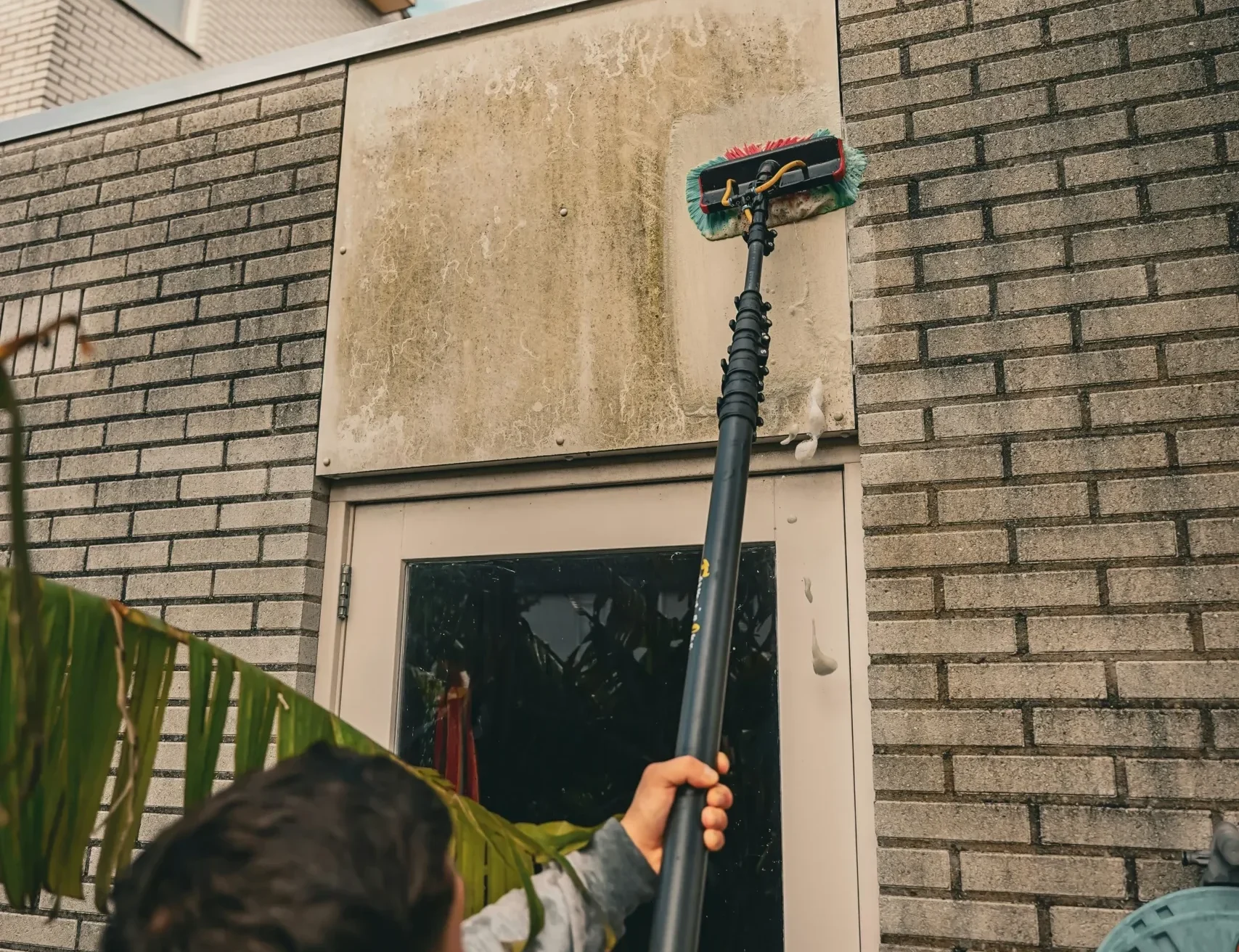 Nettoyage façade avec perche télescopique